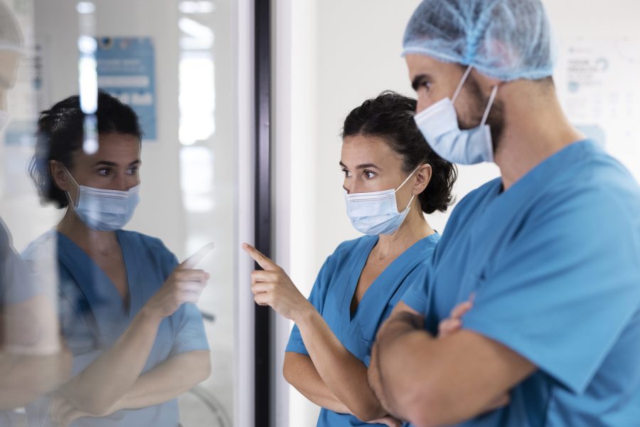 nurses-wearing-face-masks-side-view